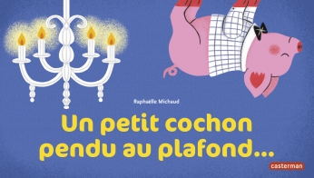 Un petit cochon pendu au plafond